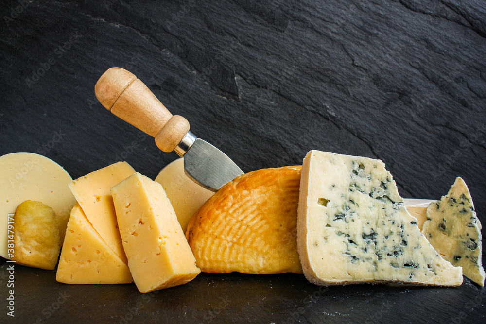 Fototapeta premium cheese many different types and grades hard and soft with mold meal on the table tasty serving size portion top view copy space for text food background rustic