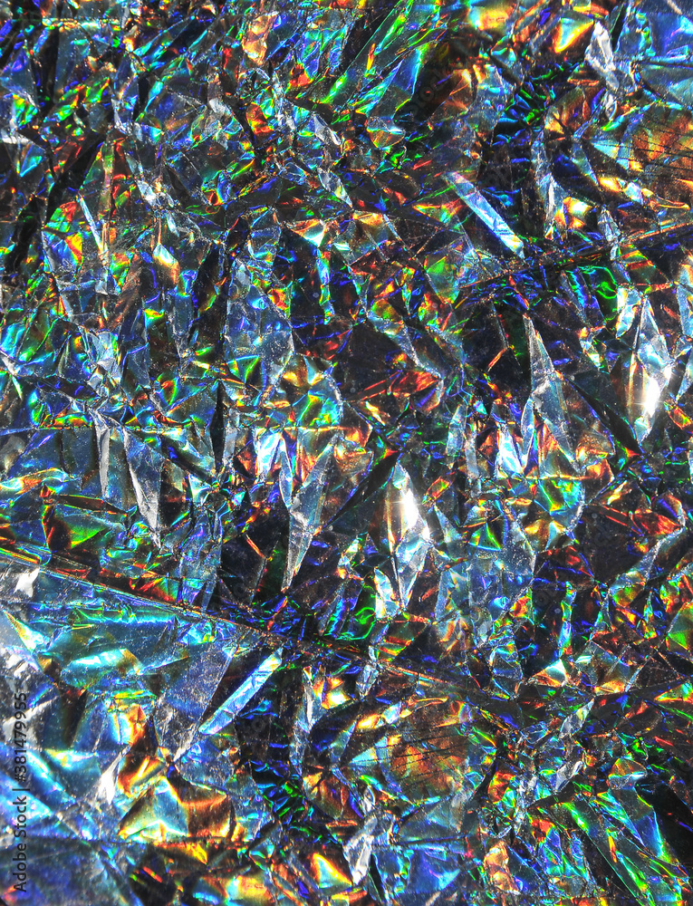 Blurred holographic foil texture. Blurred holographic foil texture.