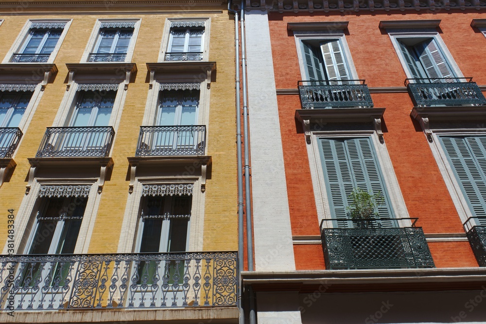 Obraz premium Toulouse, facades of houses in the city center, in local colors, yellow and orange