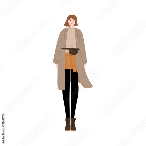 Girl wearing stylish comfortable elegant coat and skirt during autumn season