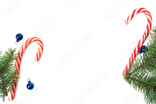 Christmas decorations, fir tree branches isolated on white background. Flat lay, top view, copy space. Christmas, winter, new year concept. Christmas composition for design.