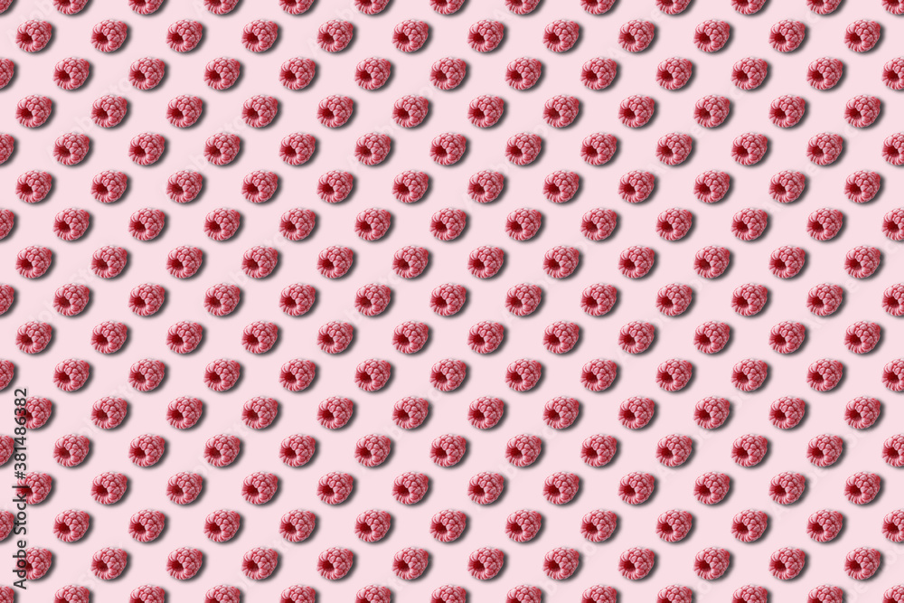 Pattern of frozen raspberry berries on a pink background. Pattern of frozen raspberry berries on a pink background.