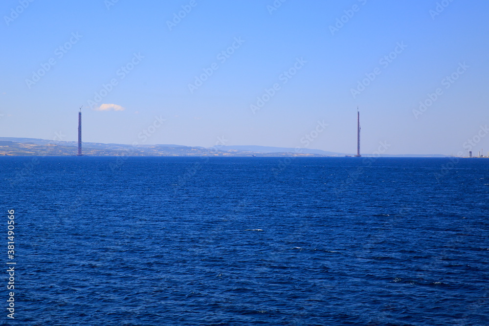 View of the Dardanelles Strait and the highway bridge poles on which the construction is started. Canakkale, Turkey