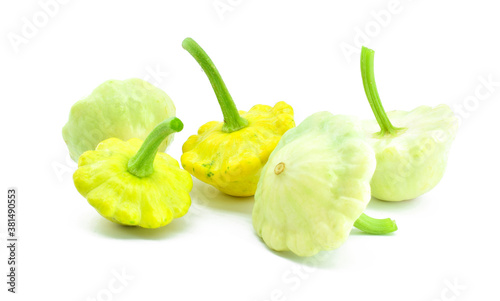 Pattypan squashes (or patty pan) isolated on white background. Healthy vegetarian food concept. photo