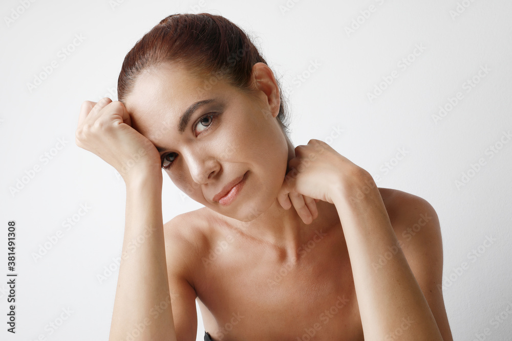 Portrait of beautiful woman with perfect skin face, concept of lifting skin. Cosmetology, elastic skin of the face.