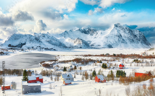 Breathtaking winter scenery over Bostad village and Torvdalshalsen lake seen from Torvdalshalsen. photo