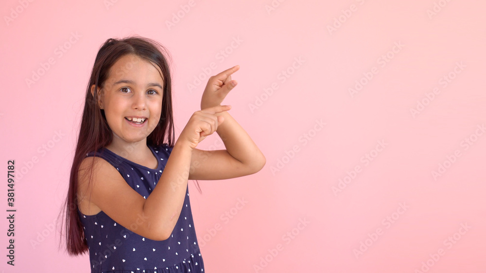 Little girl showing the writing on the wall Little girl showing the writing on the wall