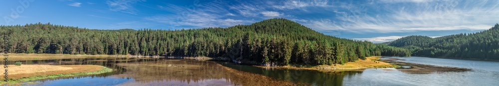 Landscape of Shiroka Polyana lake in Rhodope Mountains at autumn time