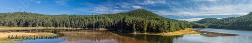 Landscape of Shiroka Polyana lake in Rhodope Mountains at autumn time
