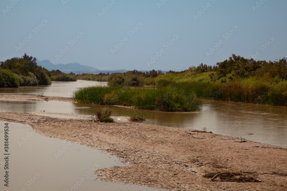 The muddy Rio Grande River