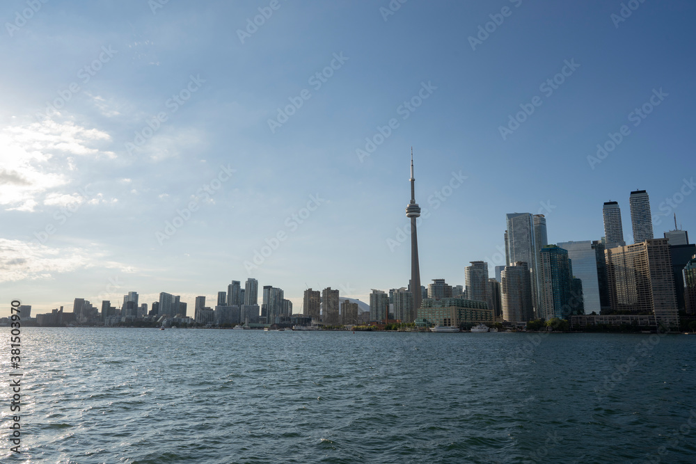 Fototapeta premium Toronto City Skyline from the ferry on a sunny day in Ontario Canada