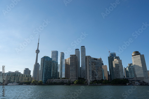 Toronto City Skyline from the ferry on a sunny day in Ontario Canada © epkatsu