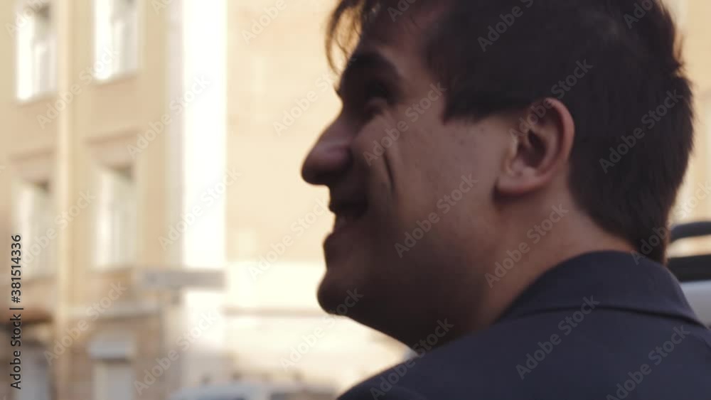 cheerful happy positive man walks in the street smiling portrait of success cheerful happy positive man walks in the street smiling portrait of success