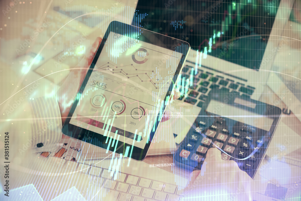 Double exposure of man's hands holding and using a digital device and forex graph drawing. Financial market concept. Double exposure of man's hands holding and using a digital device and forex graph drawing. Financial market concept.