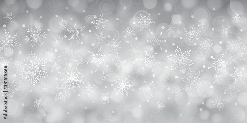 Christmas background of complex big and small falling snowflakes in gray colors with bokeh effect Christmas background of complex big and small falling snowflakes in gray colors with bokeh effect