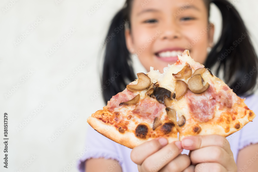mmm, so delicious!, i recommend eat this delicious pizza!, little asia girl hold the pizza piece in his hand, enjoys nice taste, wants to eat, positive woman with junk food, people and eating. mmm, so delicious!, i recommend eat this delicious pizza!, little asia girl hold the pizza piece in his hand, enjoys nice taste, wants to eat, positive woman with junk food, people and eating.