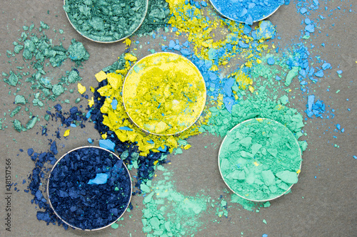 Shades of Blue and Green crushed Eyshadow on a Black background