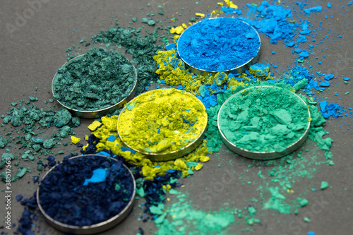 Shades of Blue and Green crushed Eyshadow on a Black background