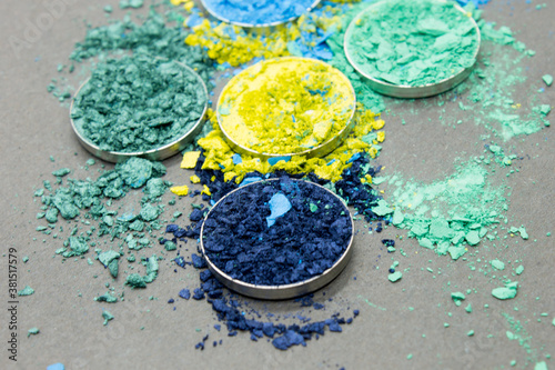 Shades of Blue and Green crushed Eyshadow on a Black background