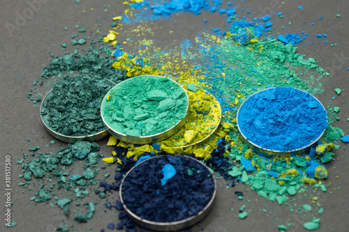 Shades of Blue and Green crushed Eyshadow on a Black background
