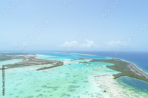 Landscape Caribbean island with shore coast of various shades of blue. National Marine Sanctuary in Los Roques, National Park