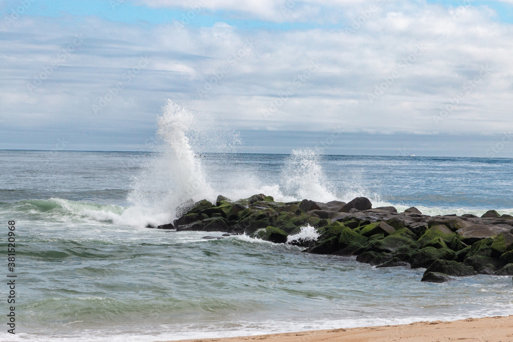 waves crashing on rocks