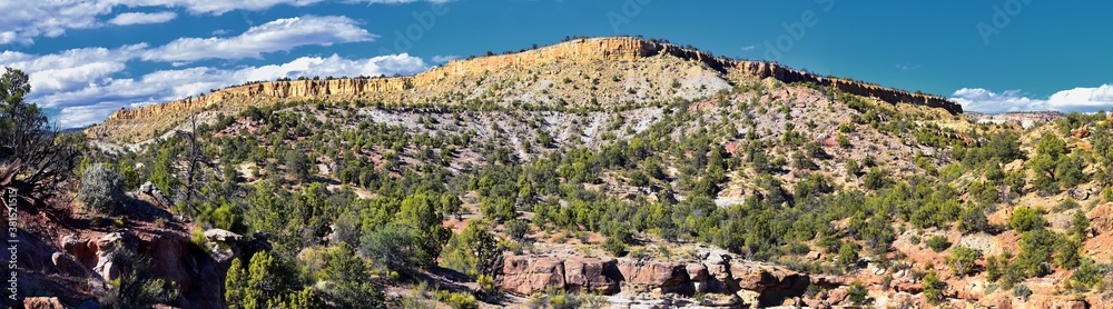Escalante Petrified Forest State Park views from hiking trail of the surrounding area, lake and trees. Utah. United States.