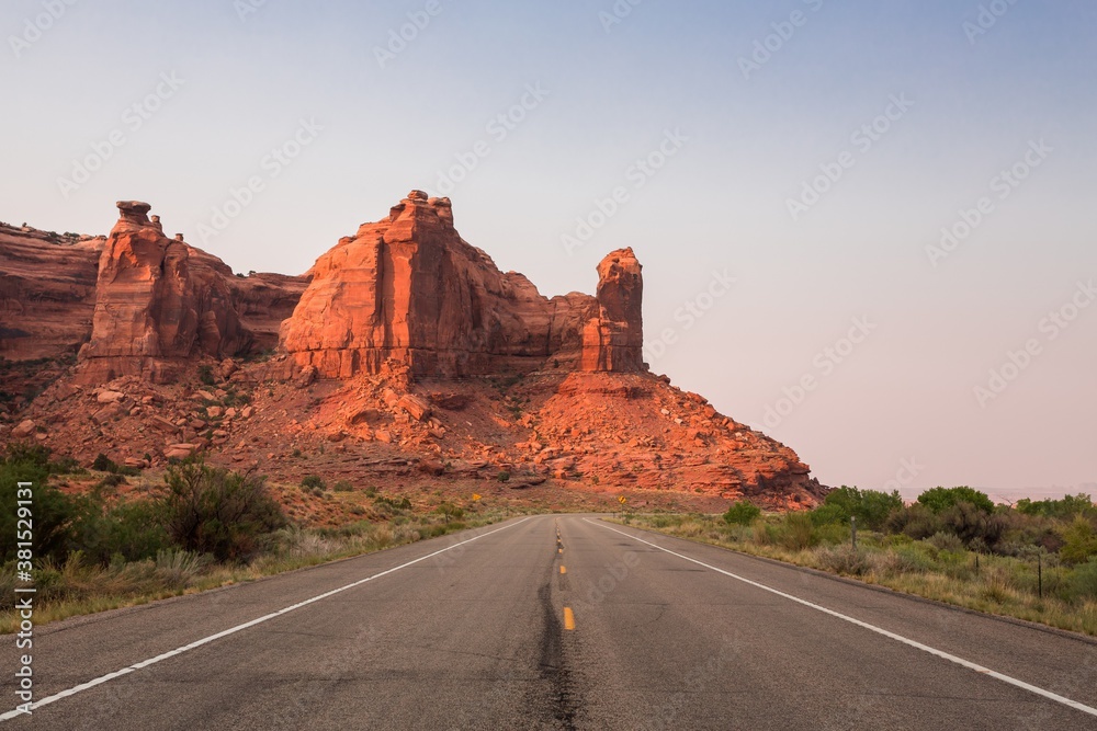 Highway in the Canyonlands National Park, Utah, USA, at sunset Highway in the Canyonlands National Park, Utah, USA, at sunset
