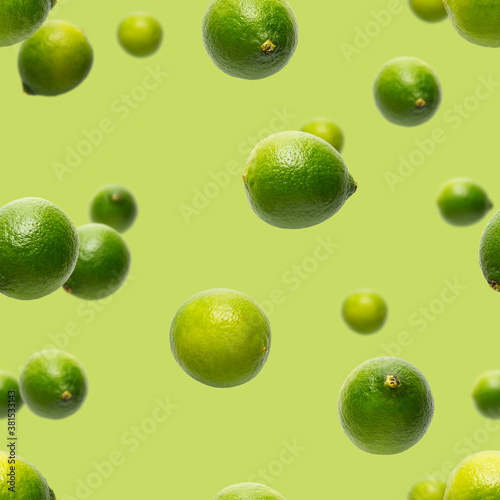 Seamless pattern with falling green lime. Tropical abstract Seamless pattern background. Lime on the green background. falling limes