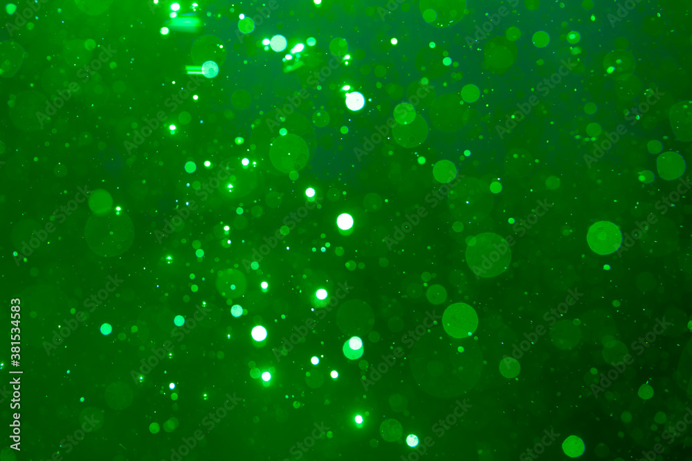 green bokeh on black background green bokeh on black background