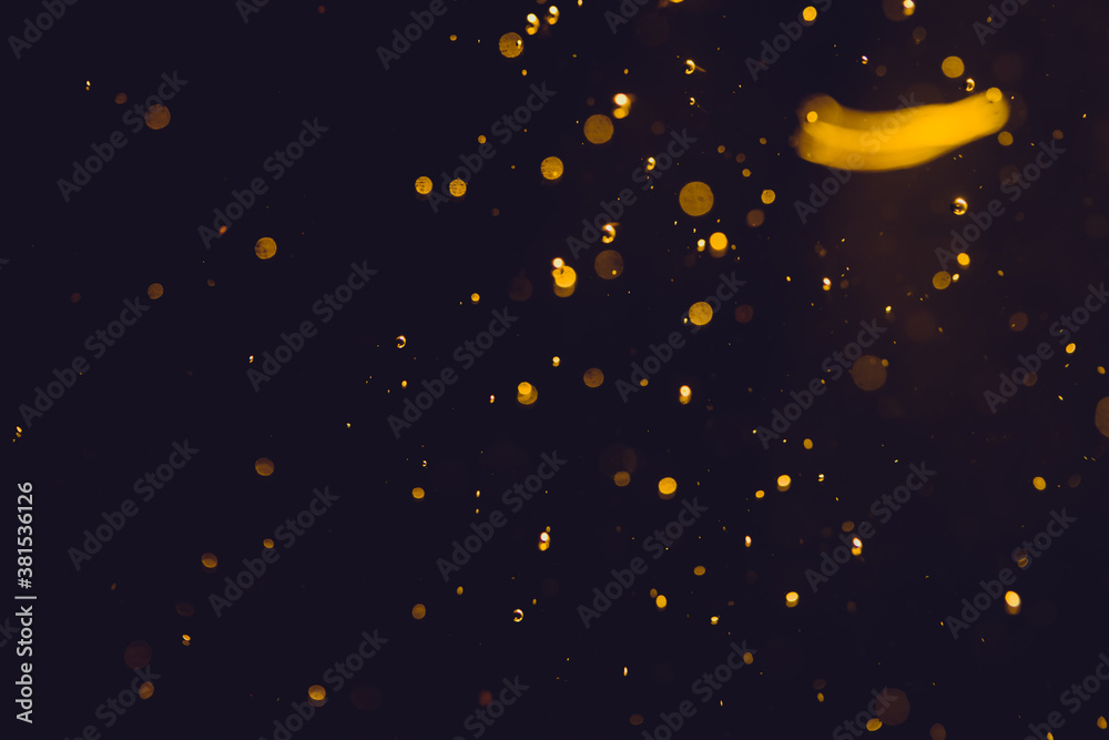 Dark Abstract Gold bokeh sparkle on black Dark Abstract Gold bokeh sparkle on black