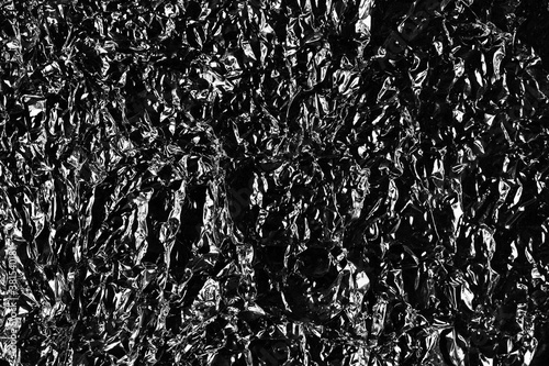 crumpled food foil surface in black and white