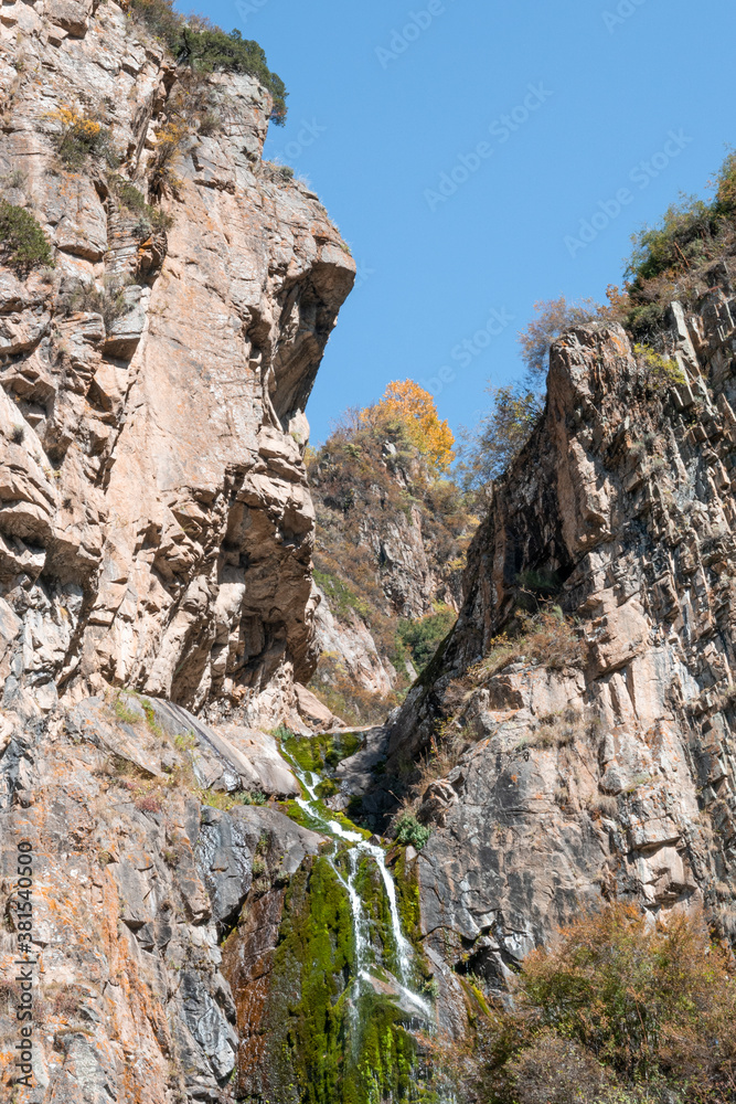 butakovskiy waterfall in the rocks, autumn landscape. Almaty, Kazakhstan
