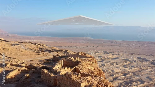 Large Triangle alien ufo over sea and desert mountains-Aerial
Drone view over Masada close to dead sea in Israel, Live footage with visual effect elements,4K
