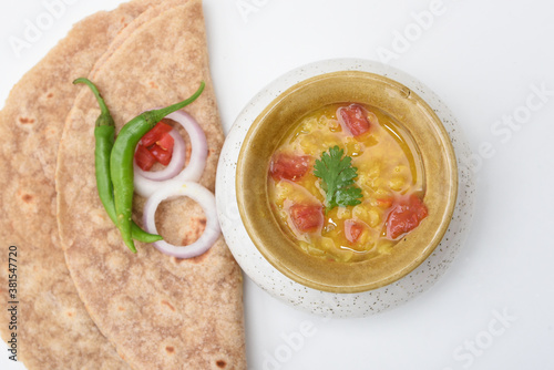 Indian flat bread Chapati and Spicy dal fry or dhal curry, roti made of whole wheat flour, Jaipur Rajasthan India. chapathi, fulka, paratha ,rumali roti