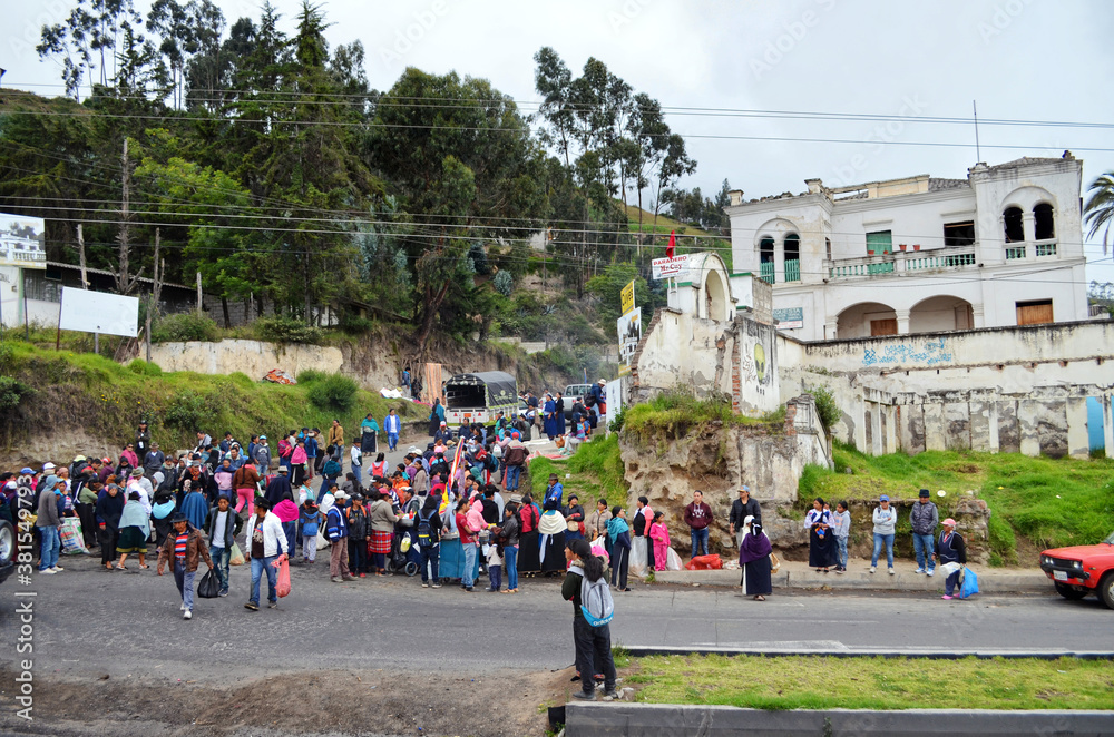 Otavalo, Ecuador - Indigenous People at entrance to Mercado de Animales