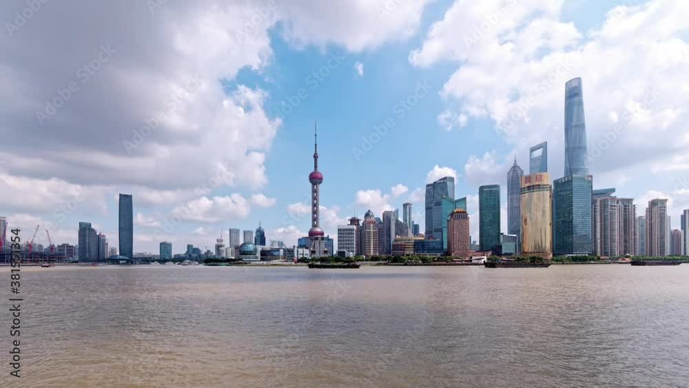 beautiful Shanghai bund cityscape with blue sky and white clouds background in afternoon, 4k footage, time lapse video. beautiful Shanghai bund cityscape with blue sky and white clouds background in afternoon, 4k footage, time lapse video.