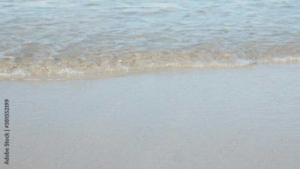 Waves in the sea, on the beach in the sunshine day Waves in the sea, on the beach in the sunshine day