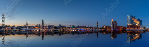 Hamburg skyline at night with reflection on Elbe