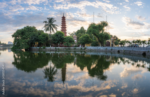 Hanoi cityscape at twilight. Tran Quoc pagoda, the oldest temple in Hanoi, Vietnam