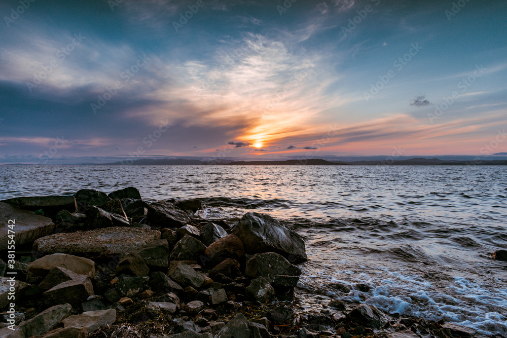 Sunset on the rocky seashore