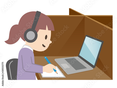 タブレットを使って勉強する女の子