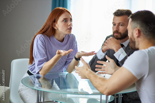 even professional psychologist is powerless to solve family problems, young caucasian couple is arguing in the presence of psychologist, listening them, ready to help