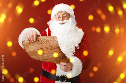 Santa Claus reading wish li...