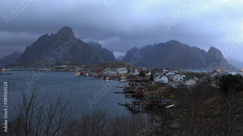View Reine fishing village from viewpoint In the atmosphere near the evening in winter, Lofoten islands, Norway