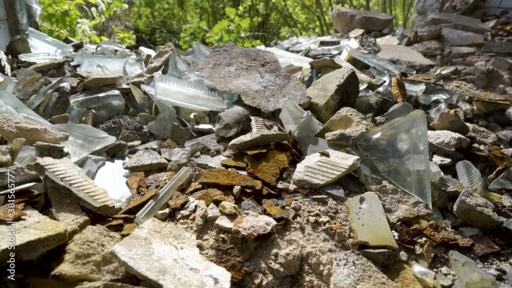 The broken and scattered glasses on the ground The broken and scattered glasses on the ground