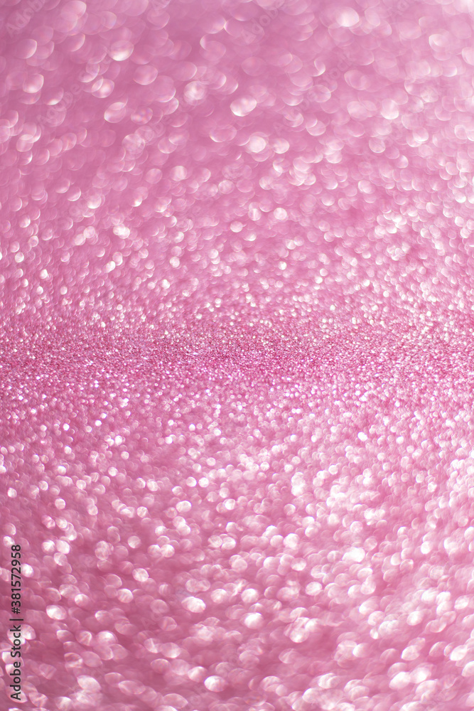 Sparkling bokeh background in a fresh pink color. pink sequins background defocus