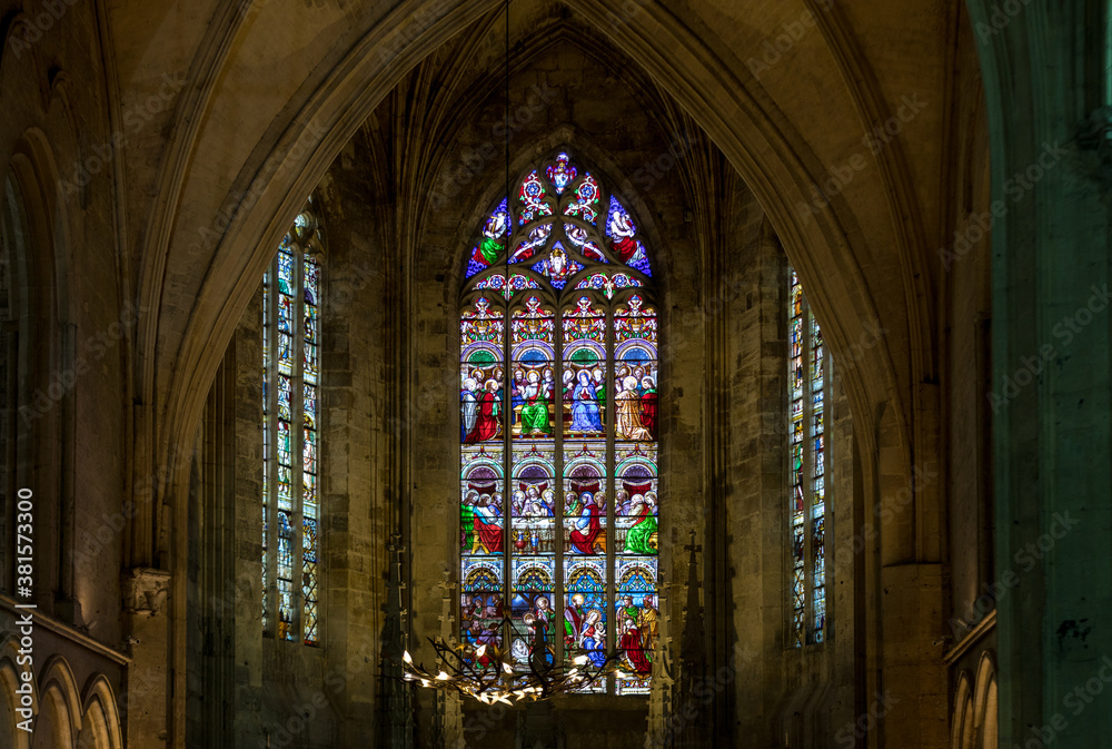  Stained glass window at the Collegiale church of Saint Emilion, France