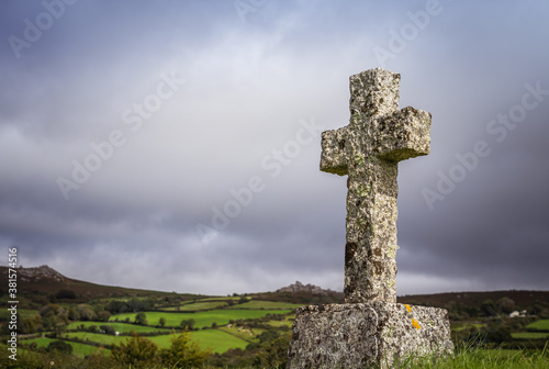 Granite cross in sunlight