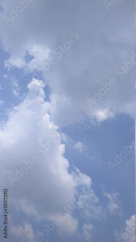 Beautiful blue sky with clouds for any copy space background